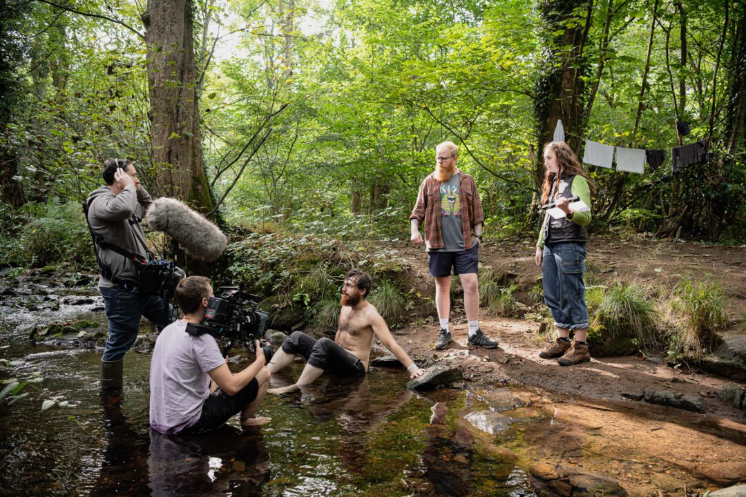 Fishbulb Films Crew Working in the woods.
